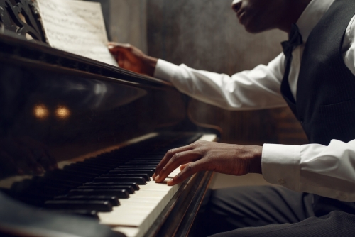 Black pianist, jazz performer on the stage