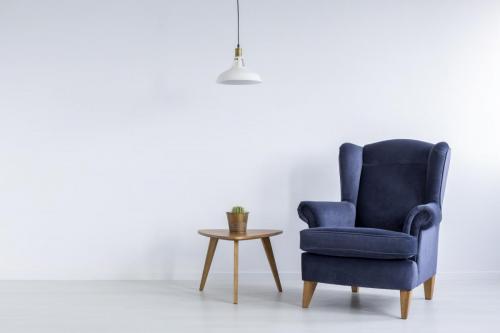 Bright interior with blue armchair